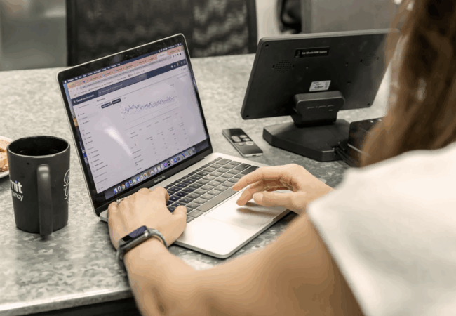 Someone looking at a chart on a computer